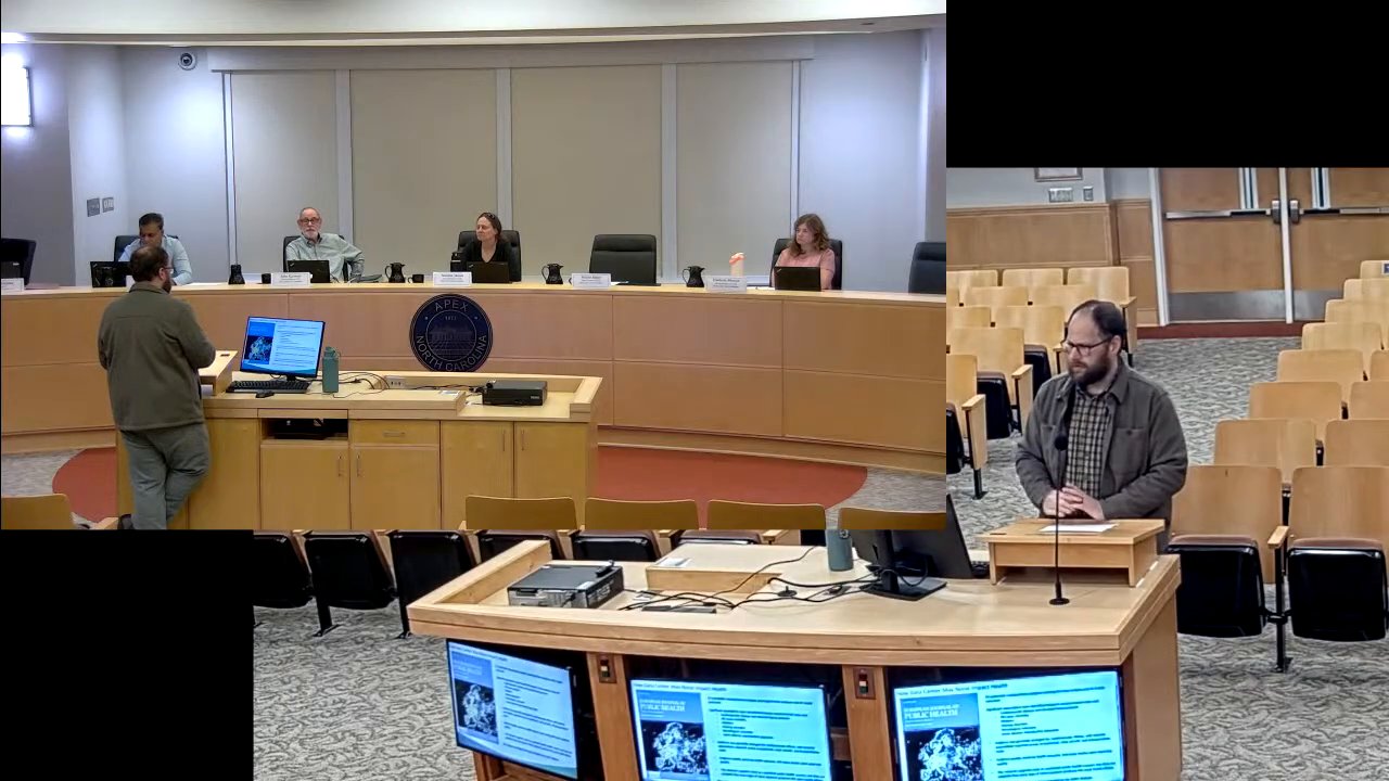 The EAB Data Center Subcommittee meeting in Council Chambers, Oct. 7, 2026, with a staff presenter at the podium