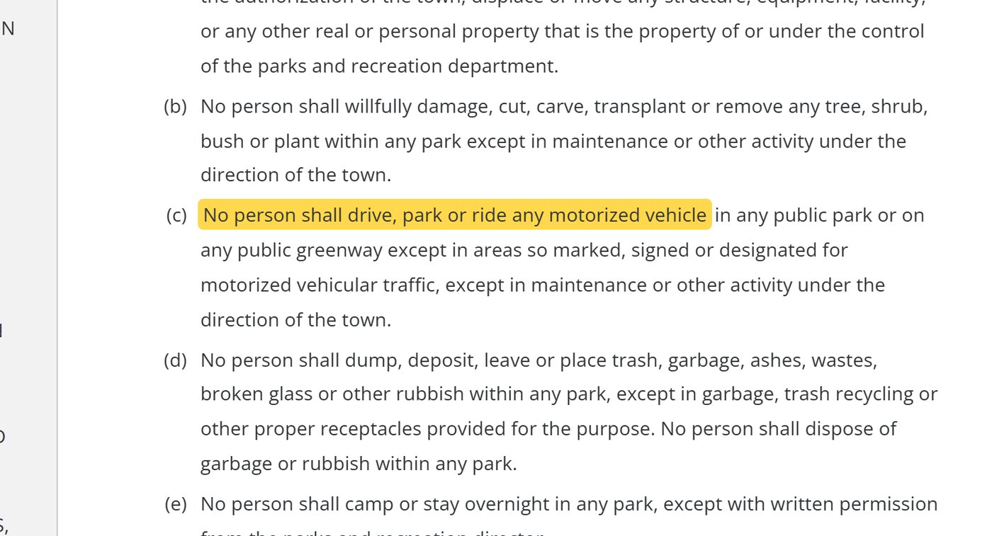 Apex Code section 15-7(c): no person shall drive, park or ride any motorized vehicle in any public park or on any public greenway except in areas so designated